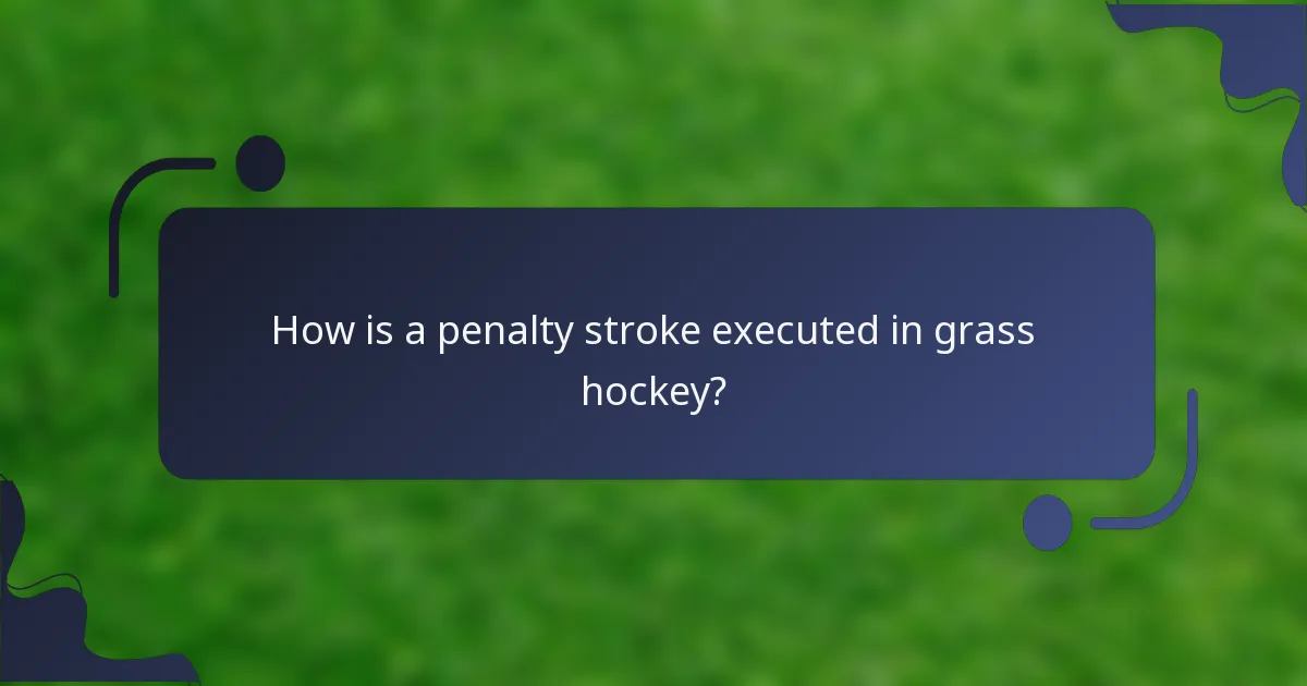 How is a penalty stroke executed in grass hockey?