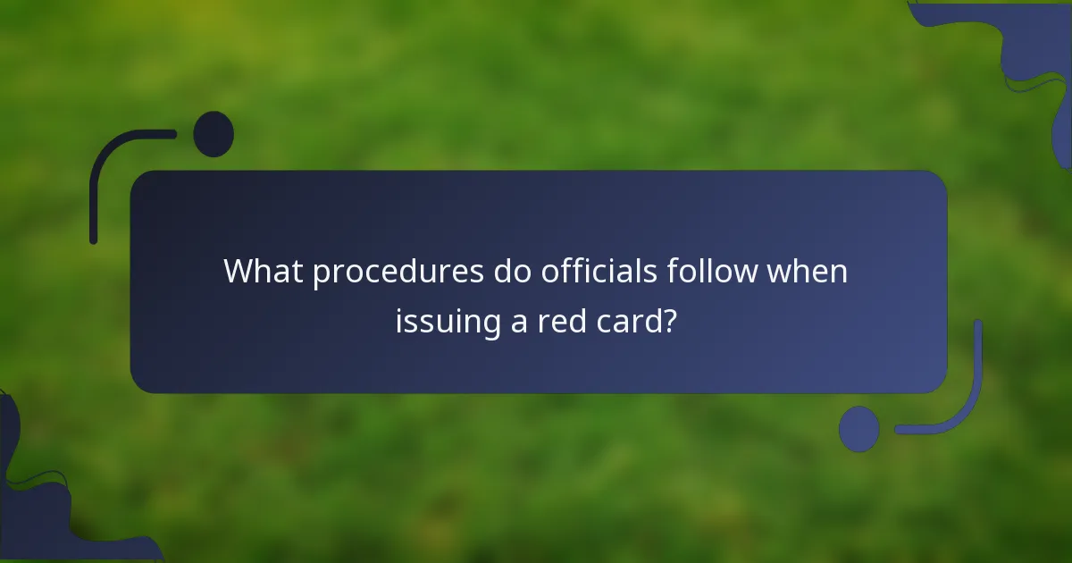 What procedures do officials follow when issuing a red card?